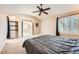 Main bedroom with carpeted floors and ceiling fan at 2553 S Troy Ct, Aurora, CO 80014