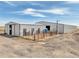 Barn, pens, and storage areas on a horse property at 44000 E 88Th Ave, Bennett, CO 80102