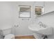 Simple bathroom featuring classic sink and fixtures with a large mirror above it at 44000 E 88Th Ave, Bennett, CO 80102