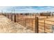Outdoor corral with sturdy fencing, post and rail fencing, and rural setting at 44000 E 88Th Ave, Bennett, CO 80102