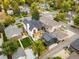 Aerial daytime view of a modern home nestled in a residential neighborhood with a cozy backyard at 1983 S Logan St, Denver, CO 80210