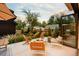 Outdoor patio featuring a firepit with lounge seating and outdoor dining area at 1983 S Logan St, Denver, CO 80210
