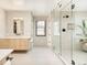 Modern bathroom with sleek vanity, glass-enclosed shower, and stylish fixtures for a spa-like experience at 1983 S Logan St, Denver, CO 80210