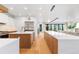 Spacious kitchen with dual islands, modern cabinets, and stainless steel appliances at 1983 S Logan St, Denver, CO 80210