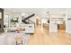 Bright, open living space with hardwood floors and modern staircase at 1983 S Logan St, Denver, CO 80210