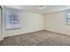 Comfortable bedroom with carpet floors and natural light, perfect for a restful night's sleep at 4240 S Yukon Way, Lakewood, CO 80235