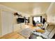 Relaxing living room featuring hardwood floors, and a TV at 1212 S Uvalda St, Aurora, CO 80012