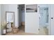 View from primary bedroom into ensuite bathroom and walk-in closet at 3450 S Poplar St # 307, Denver, CO 80224