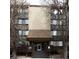Charming apartment building exterior with well-maintained landscaping and inviting entrance at 3450 S Poplar St # 307, Denver, CO 80224