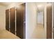 Hallway lined with tenant storage closets and clean flooring at 3450 S Poplar St # 307, Denver, CO 80224