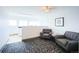 Inviting resident lounge with comfortable seating and convenient laundry facilities at 3450 S Poplar St # 307, Denver, CO 80224