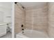 Bathroom features a tiled shower and bath combination at 921 S Zeno Way # 201, Aurora, CO 80017