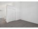 Cozy bedroom featuring carpet floors, a closet, and neutral walls at 921 S Zeno Way # 201, Aurora, CO 80017