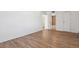 Spacious bedroom features wood-look flooring, white walls, and plenty of natural light at 921 S Zeno Way # 201, Aurora, CO 80017