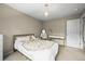 Charming bedroom features a vanity, chandelier, neutral tones, and carpeted flooring at 12625 W 66Th Cir, Arvada, CO 80004