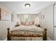 Inviting bedroom with warm lighting, decorative accents, and a comfortable bed at 12625 W 66Th Cir, Arvada, CO 80004