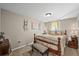 Cozy bedroom features warm lighting, decorative accents, and a comfortable bed at 12625 W 66Th Cir, Arvada, CO 80004