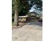 Charming two-story home with a brick facade, attached two-car garage, and spacious driveway at 12625 W 66Th Cir, Arvada, CO 80004
