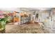 Spacious living area that is featuring hardwood floors and an open layout at 12625 W 66Th Cir, Arvada, CO 80004