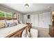 Elegant main bedroom with large windows, decorative pillows, and ample closet space at 12625 W 66Th Cir, Arvada, CO 80004
