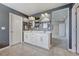 Elegant bathroom with double vanity, sleek mirrors, modern lighting, and stylish gray walls at 23957 E Rocky Top Ave, Aurora, CO 80016