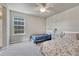 Comfortable bedroom with two twin beds, creating a cozy and functional space at 23957 E Rocky Top Ave, Aurora, CO 80016
