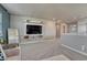 Upstairs loft features carpet, TV, and easy access to other bedrooms at 23957 E Rocky Top Ave, Aurora, CO 80016