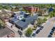 Eye-level view displaying the contemporary home with a two-car garage in a well-maintained yard at 2801 Lawrence St, Denver, CO 80205