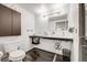 Bathroom with modern fixtures, double sink, cabinet, and shower at 2801 Lawrence St, Denver, CO 80205