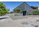 Contemporary home featuring modern architectural design, secure fencing, and landscaped surroundings at 2801 Lawrence St, Denver, CO 80205