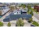 Stunning aerial shot of the property, featuring a modern home with a well-manicured yard and garden at 2801 Lawrence St, Denver, CO 80205