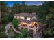 Luxury home with expansive deck, hot tub, and stunning mountain views at 967 Country Club Pkwy, Castle Rock, CO 80108