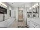 Luxurious bathroom with soaking tub, walk-in shower, and double vanity at 967 Country Club Pkwy, Castle Rock, CO 80108