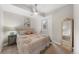 Spacious bedroom with a comfy bed and large mirror at 967 Country Club Pkwy, Castle Rock, CO 80108