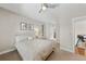 Spacious bedroom with window, bathroom access, and ample space at 967 Country Club Pkwy, Castle Rock, CO 80108
