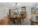 Elegant dining room with a round table and fireplace at 967 Country Club Pkwy, Castle Rock, CO 80108