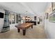 Game room, pool table, bar area, and plenty of natural light at 967 Country Club Pkwy, Castle Rock, CO 80108