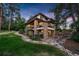 Stunning home exterior with stone accents and landscaping at 967 Country Club Pkwy, Castle Rock, CO 80108