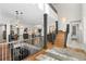 Open floor plan with hardwood floors and a modern staircase at 967 Country Club Pkwy, Castle Rock, CO 80108