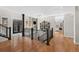 Spacious interior with hardwood floors, modern staircase, and high ceilings at 967 Country Club Pkwy, Castle Rock, CO 80108