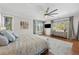 Spacious main bedroom with stunning views, high ceilings, and a ceiling fan at 967 Country Club Pkwy, Castle Rock, CO 80108