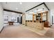 Open basement area includes a billiards table and bar area, offering plenty of space for recreation and leisure at 5375 Twilight Way, Parker, CO 80134