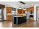 Modern kitchen with granite countertops, stainless steel appliances, and large center island at 5375 Twilight Way, Parker, CO 80134