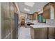 Bright kitchen features stainless steel appliances, quartz countertops, and ample cabinet space at 8944 W 66Th Pl, Arvada, CO 80004