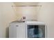Clean laundry area equipped with a Maytag washer and dryer at 8944 W 66Th Pl, Arvada, CO 80004