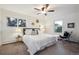Serene bedroom with plush carpeting, neutral decor, and ample natural light creating a cozy retreat for relaxation at 4634 S Adobe Ct, Littleton, CO 80127