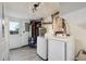 Laundry room featuring a washer and dryer with utility sink and decor at 4634 S Adobe Ct, Littleton, CO 80127