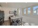 Bright kitchen featuring an island with seating, stainless steel appliances, and modern finishes at 5035 N Walden Way, Denver, CO 80249