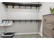 Walk-in closet with ample hanging space, shelving, and a dresser for organized storage at 7755 E Quincy # 201, Denver, CO 80237