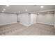 Spacious finished basement featuring plush carpeting and neutral paint colors at 4933 W 61St Ave, Arvada, CO 80003